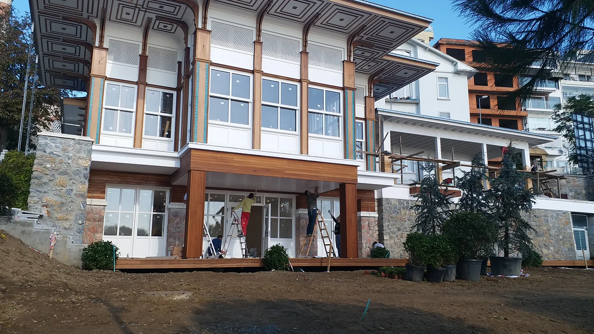 How Are Cracks Repaired Before Exterior Painting?