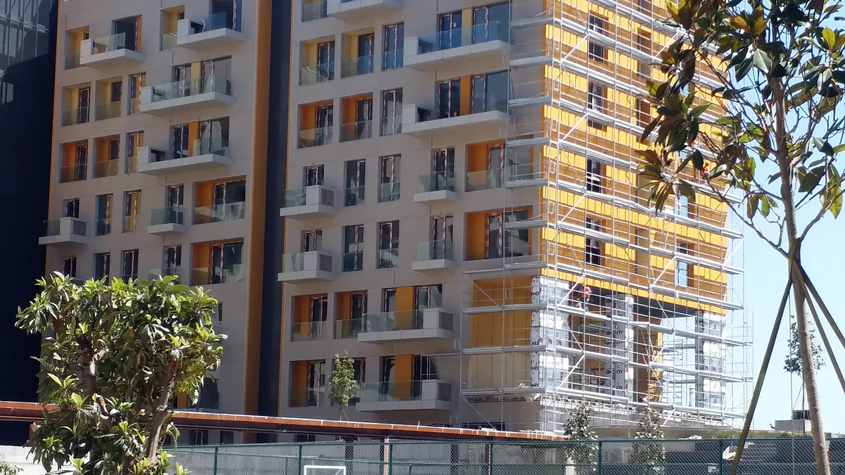 Why Does Paint Fade Faster on a Sunny Facade?